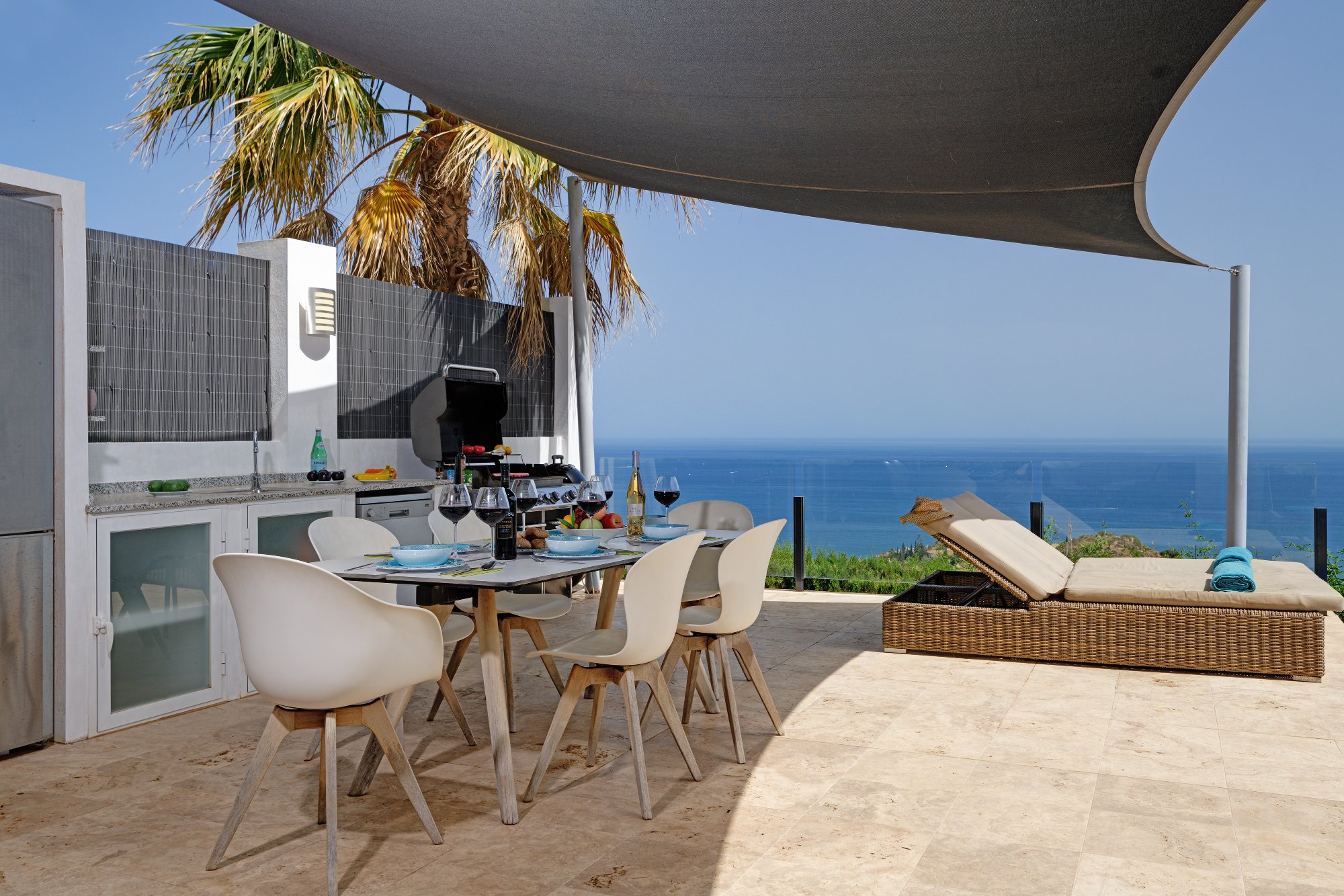 Outdoor dining terrace with sea view on the Costa del Sol
